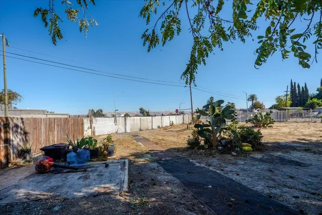 a view of a backyard of a house