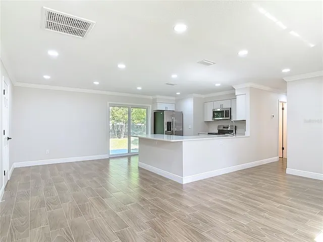 a bathroom with a sink a toilet and a bathtub