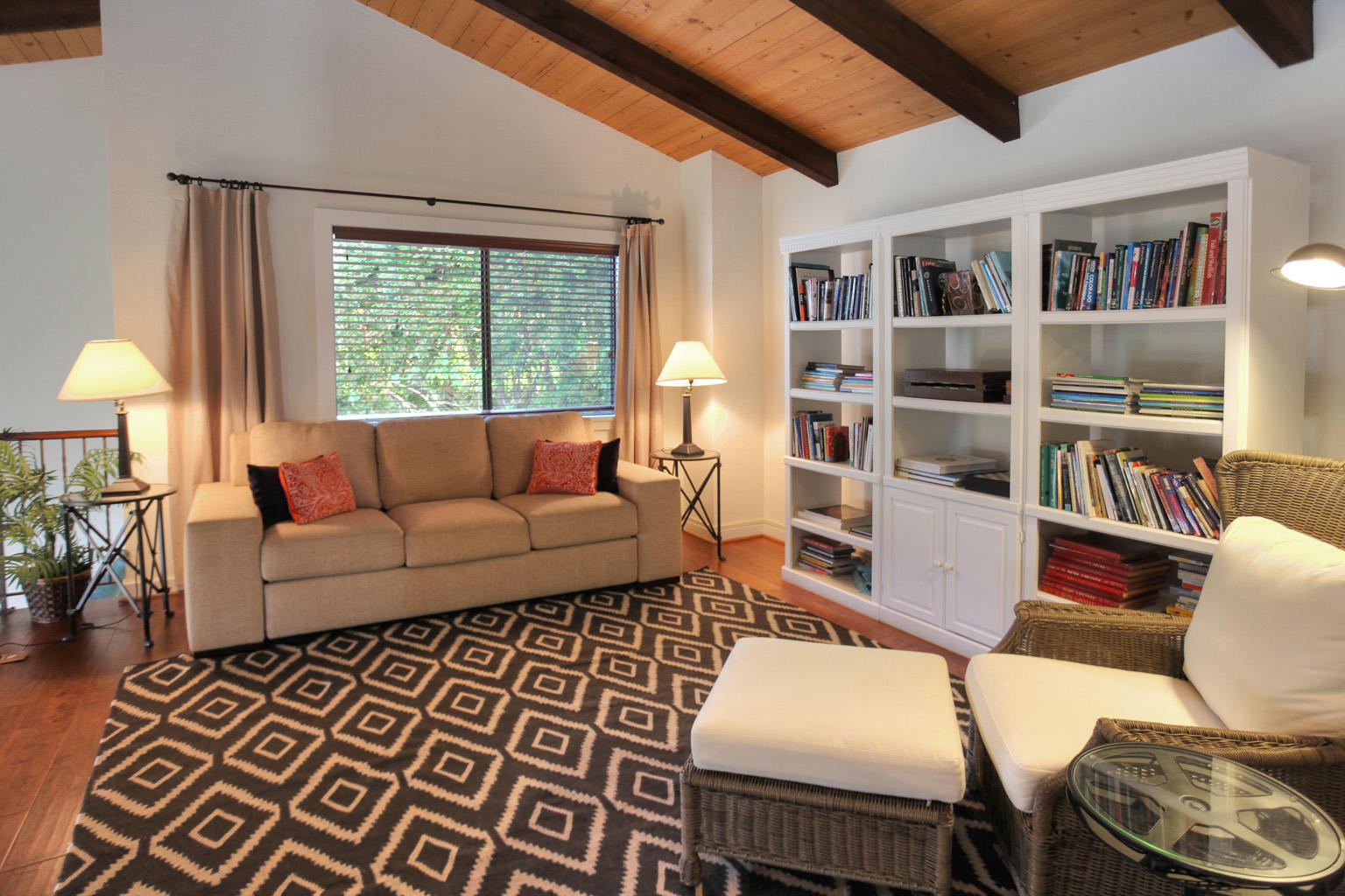 393 Las Alturas Road Santa Barbara, CA 93103 - Photo 7 of 17 a living room with furniture and a window