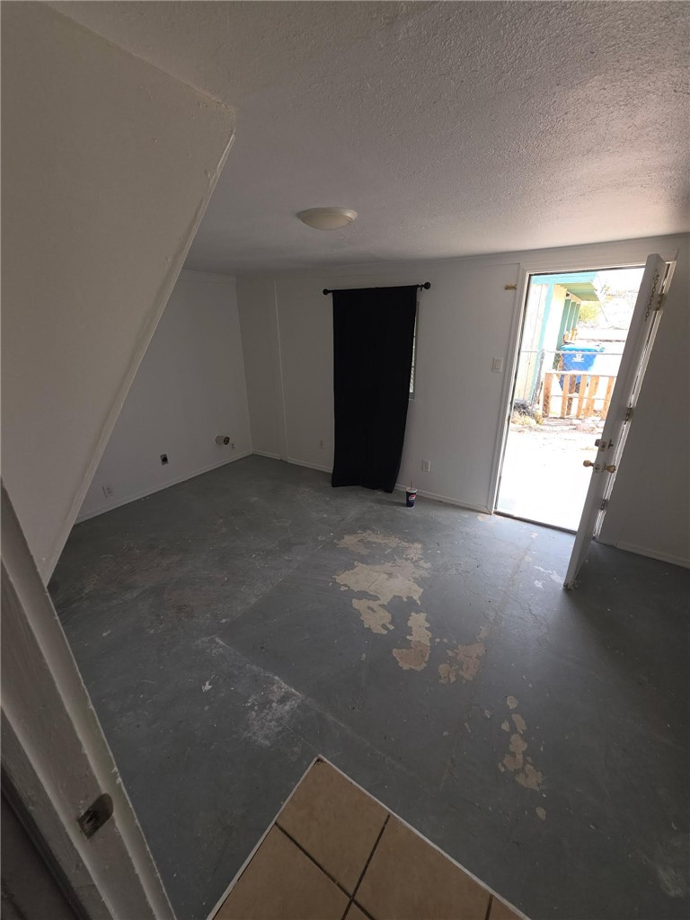 512 E Street Needles, CA 92363 - Photo 11 of 20 an empty room with windows