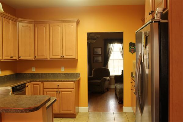 8 Button Road Easthampton, MA 01027 - Photo 4 of 10 a kitchen with a refrigerator and a sink