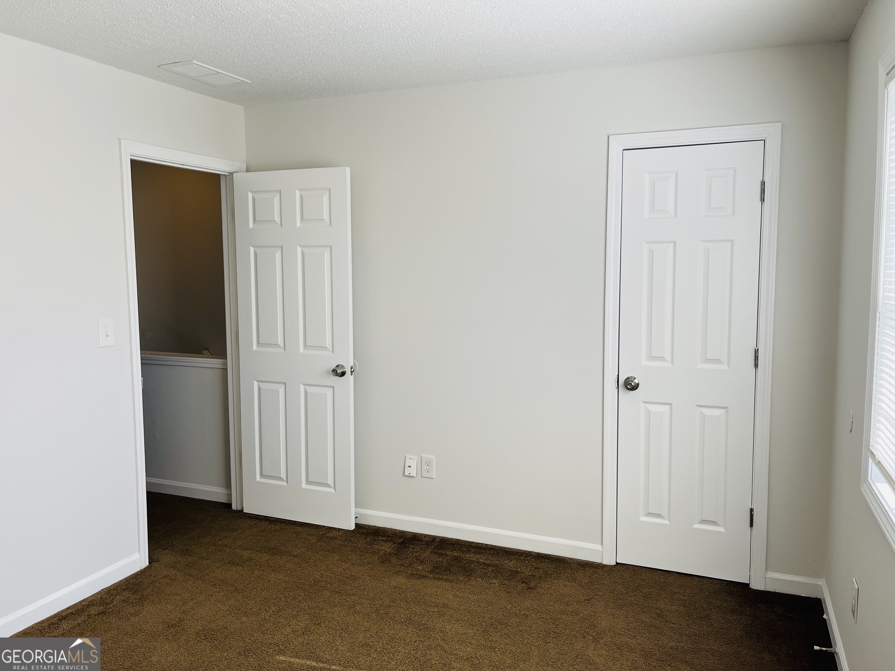 1701 Hunting Creek Lane Southeast, Unit 1701 Conyers, GA 30013 - Photo 14 of 20 a view of an empty room