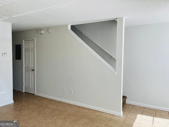 a view of hallway with stairs