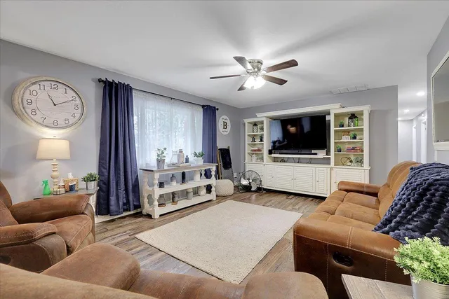 a kitchen with a stove and a refrigerator
