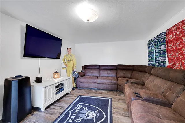 a living room with furniture and a couch