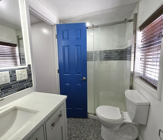 a kitchen with stainless steel appliances granite countertop a refrigerator sink and cabinets