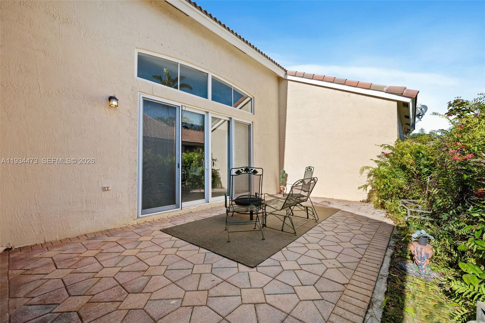 18900 Southwest 29th Street Miramar, FL 33029 - Photo 24 of 40 a outdoor space with a couch and chairs