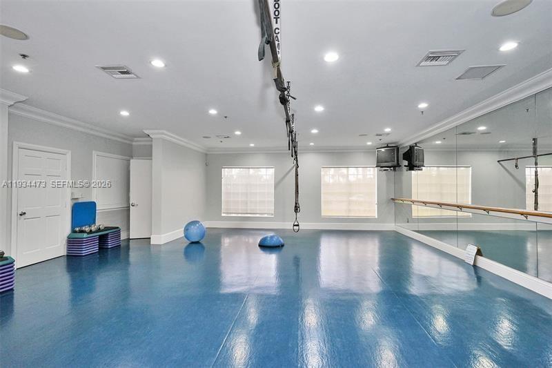 18900 Southwest 29th Street Miramar, FL 33029 - Photo 34 of 40 a view of an empty room with wooden floor and a couch