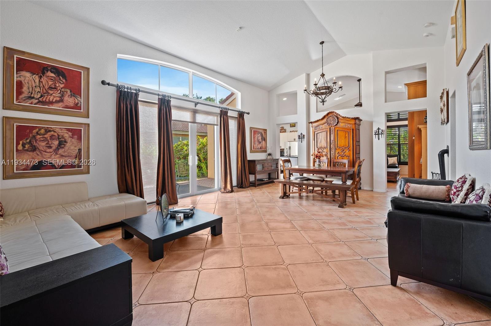 18900 Southwest 29th Street Miramar, FL 33029 - Photo 6 of 40 a living room with fireplace furniture and a large window