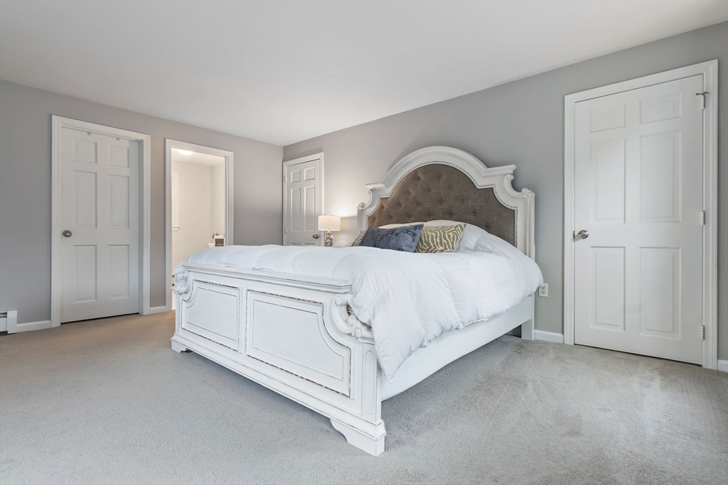 4 Brookside Court Methuen, MA 01844 - Photo 24 of 39 a bedroom with a bed and a window