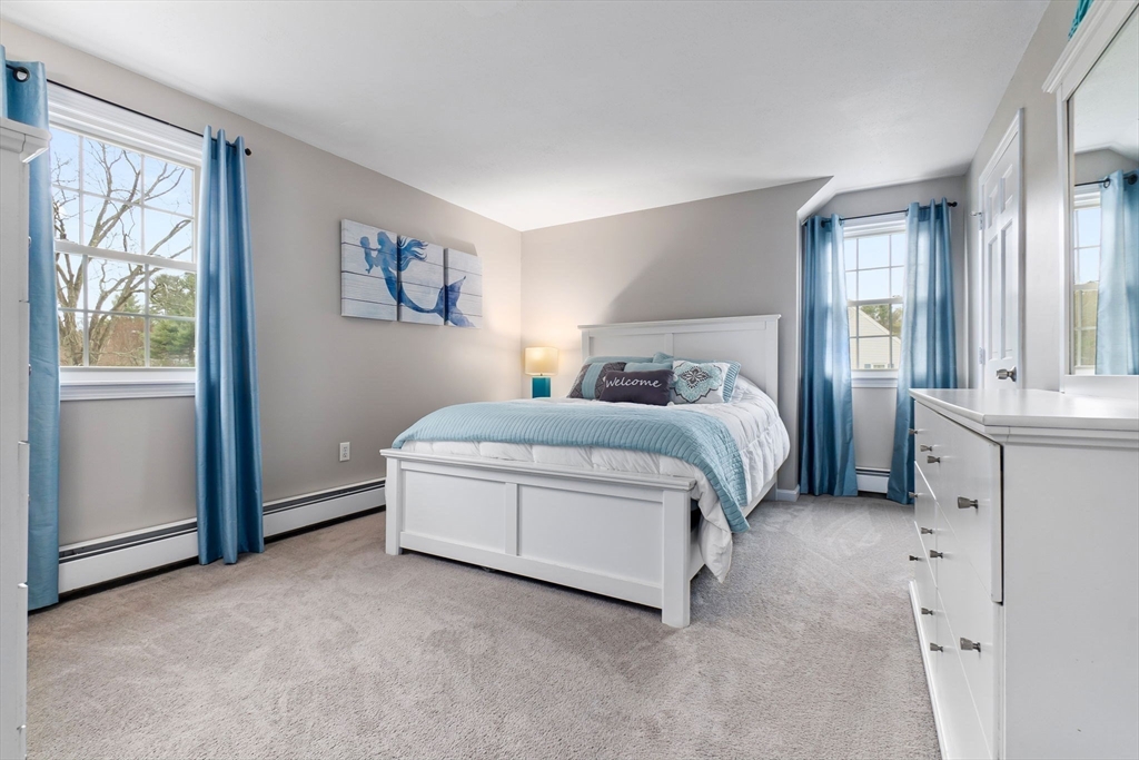 4 Brookside Court Methuen, MA 01844 - Photo 30 of 39 a bed room with a bed and a window