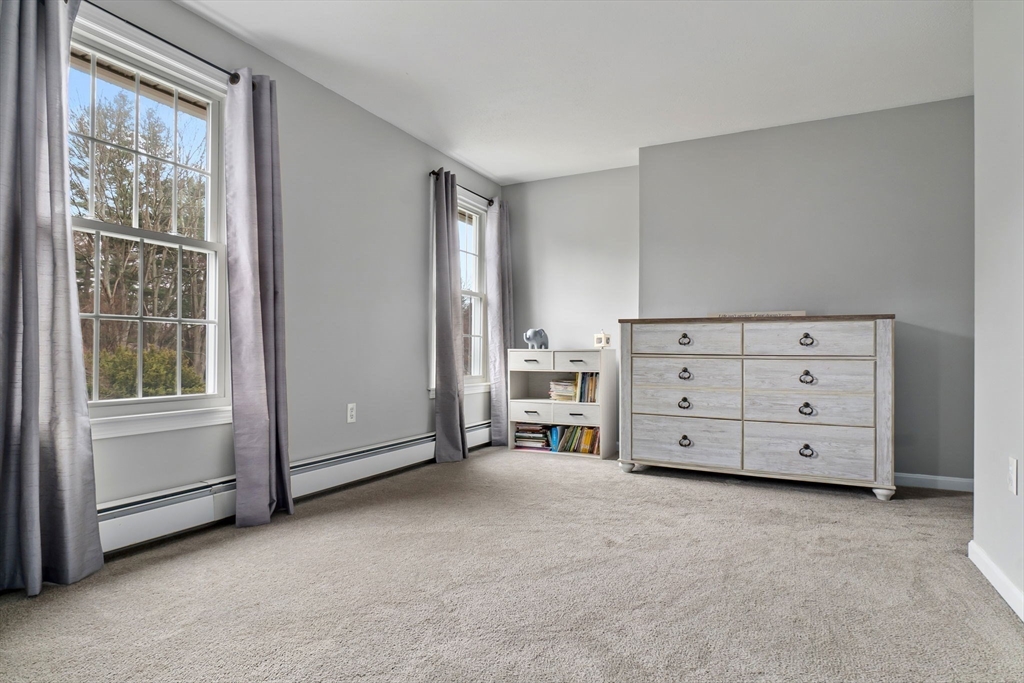 4 Brookside Court Methuen, MA 01844 - Photo 32 of 39 a view of a bedroom with cabinet