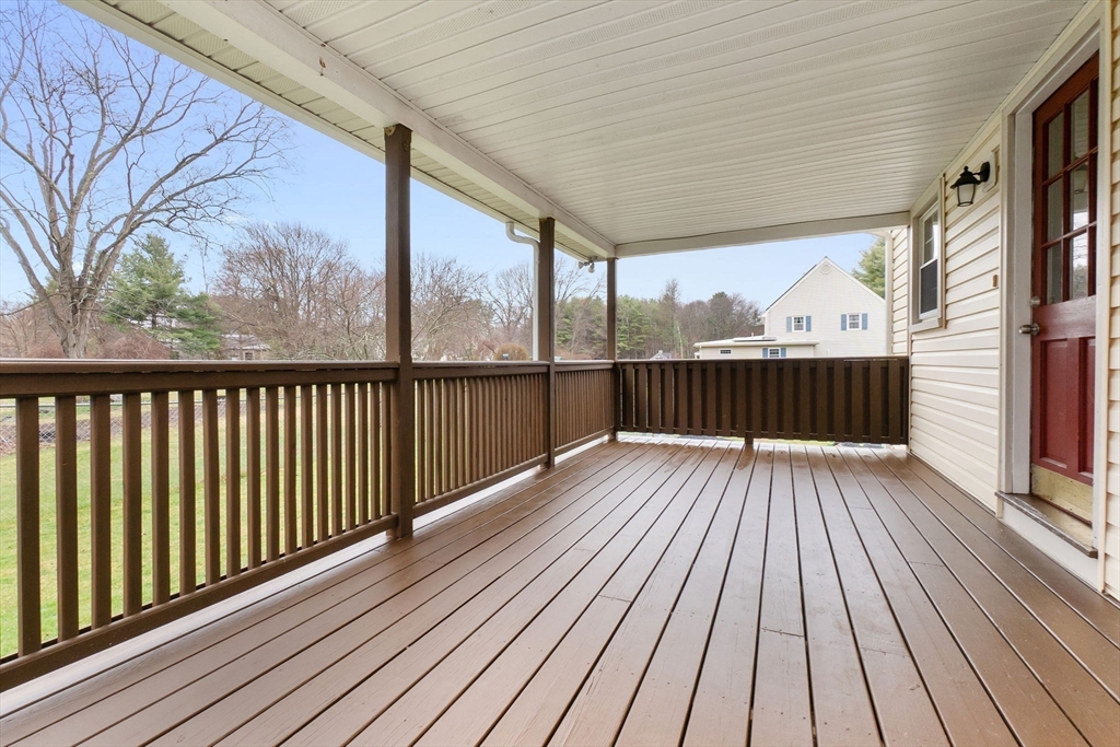 4 Brookside Court Methuen, MA 01844 - Photo 34 of 39 a view of a wooden deck with a yard