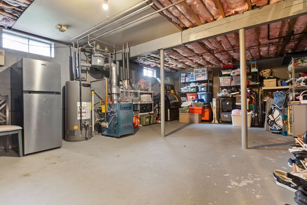 4 Brookside Court Methuen, MA 01844 - Photo 35 of 39 a view of a storage room with a lot of stuff