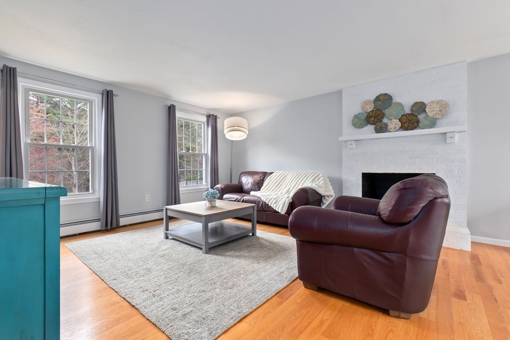 4 Brookside Court Methuen, MA 01844 - Photo 8 of 39 a living room with furniture and a fireplace