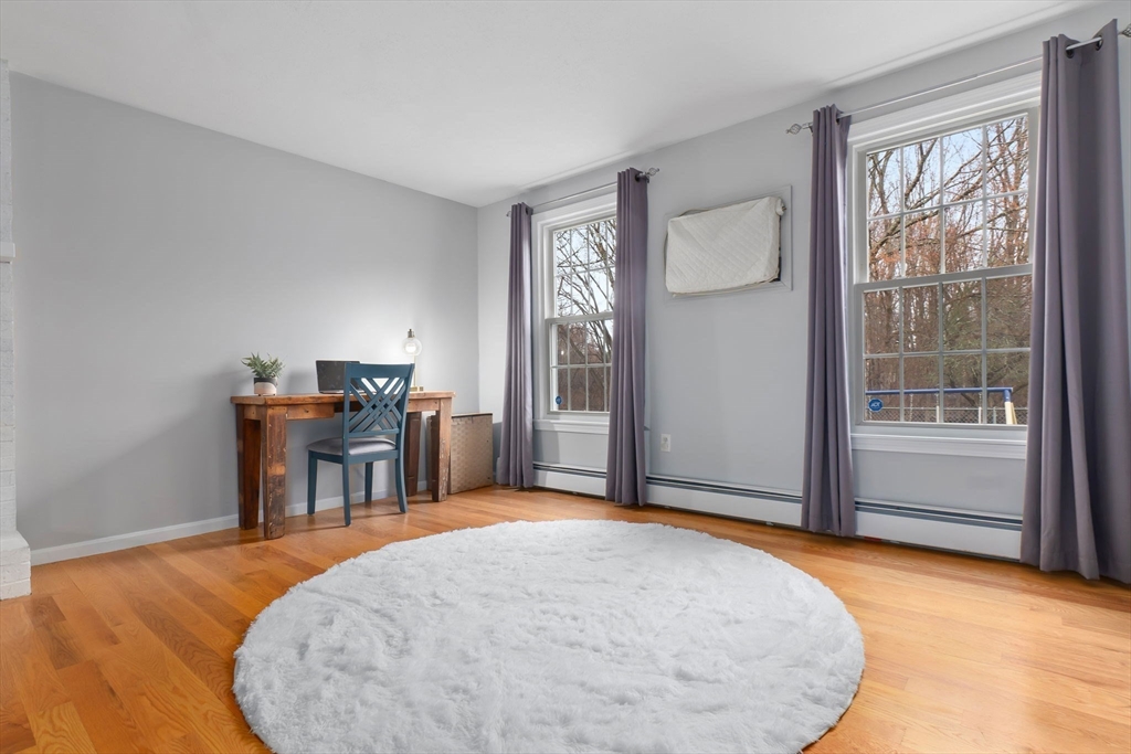 4 Brookside Court Methuen, MA 01844 - Photo 10 of 39 an empty room with windows and cabinet