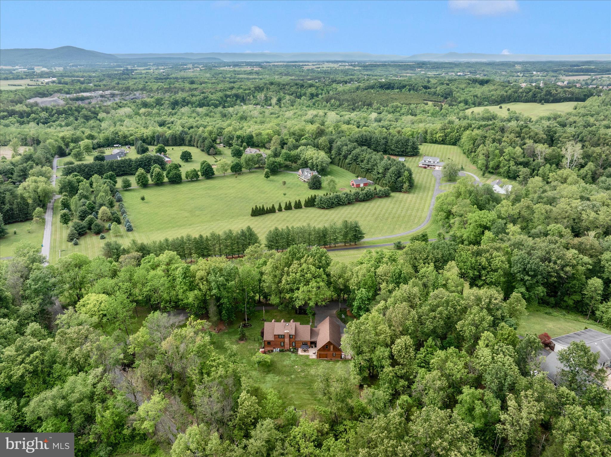 15810 Spade Road Hagerstown, MD 21740 - Photo 63 of 76 a view of a lush green outdoor space with a lake view and mountain view