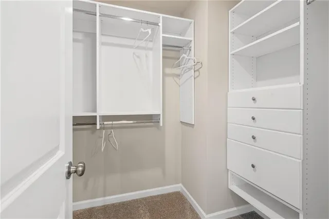 a view of a hallway with closet