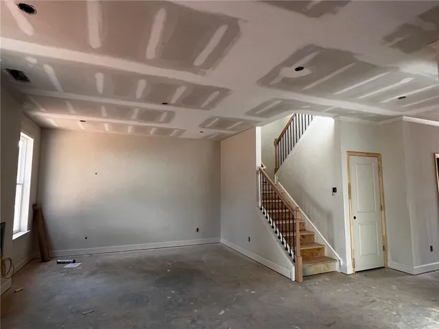 a living room with furniture fireplace and flat screen tv