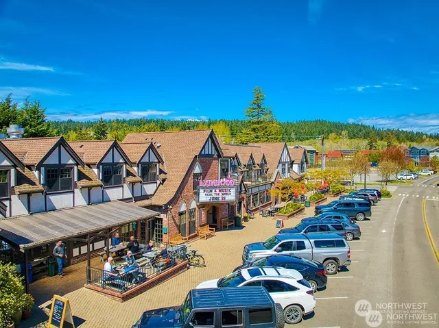 a front view of a building with garden