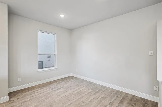 an empty room with a workspace