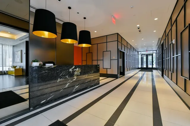 a view of a living room and bathroom