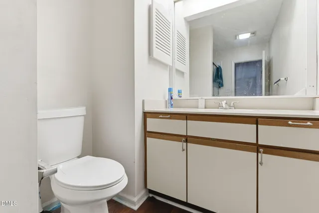 a view of staircase with wooden floor