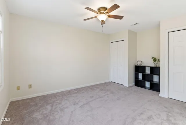 a bathroom with a shower a sink and mirror