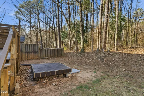 a view of a street sign that is on the side of the road