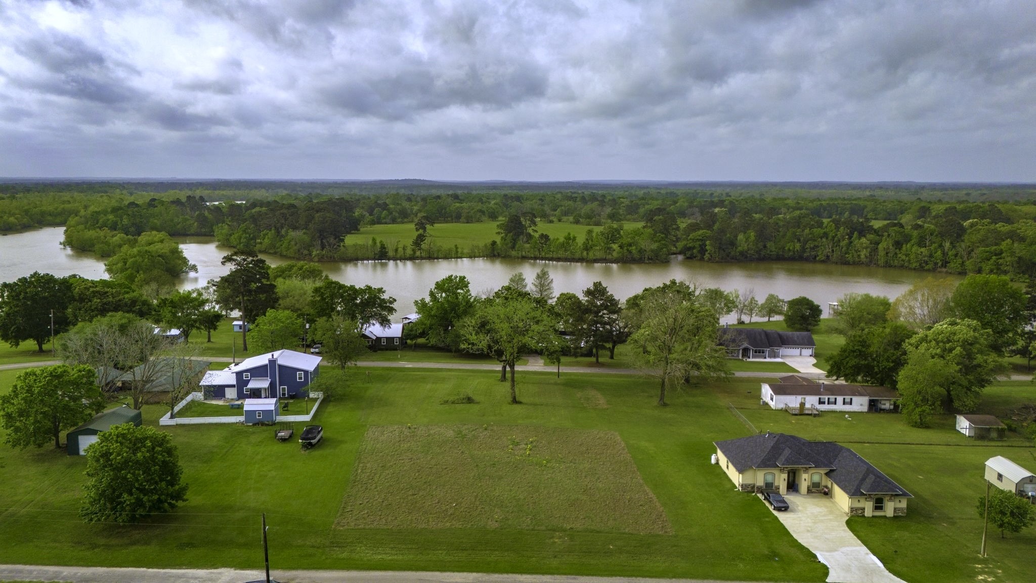 Tbd Liendo Drive Trinity, TX 75862 - Photo 1 of 13 a view of a lake with houses in back