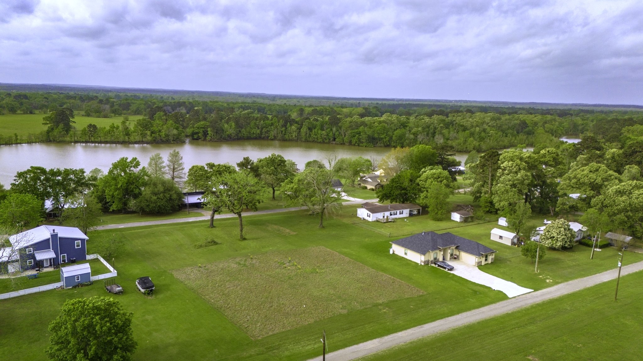 Tbd Liendo Drive Trinity, TX 75862 - Photo 4 of 13 a view of a city with an ocean