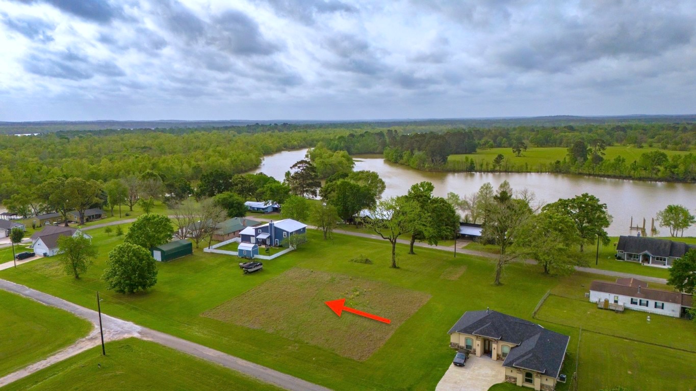 Tbd Liendo Drive Trinity, TX 75862 - Photo 5 of 13 a view of a golf course with chairs
