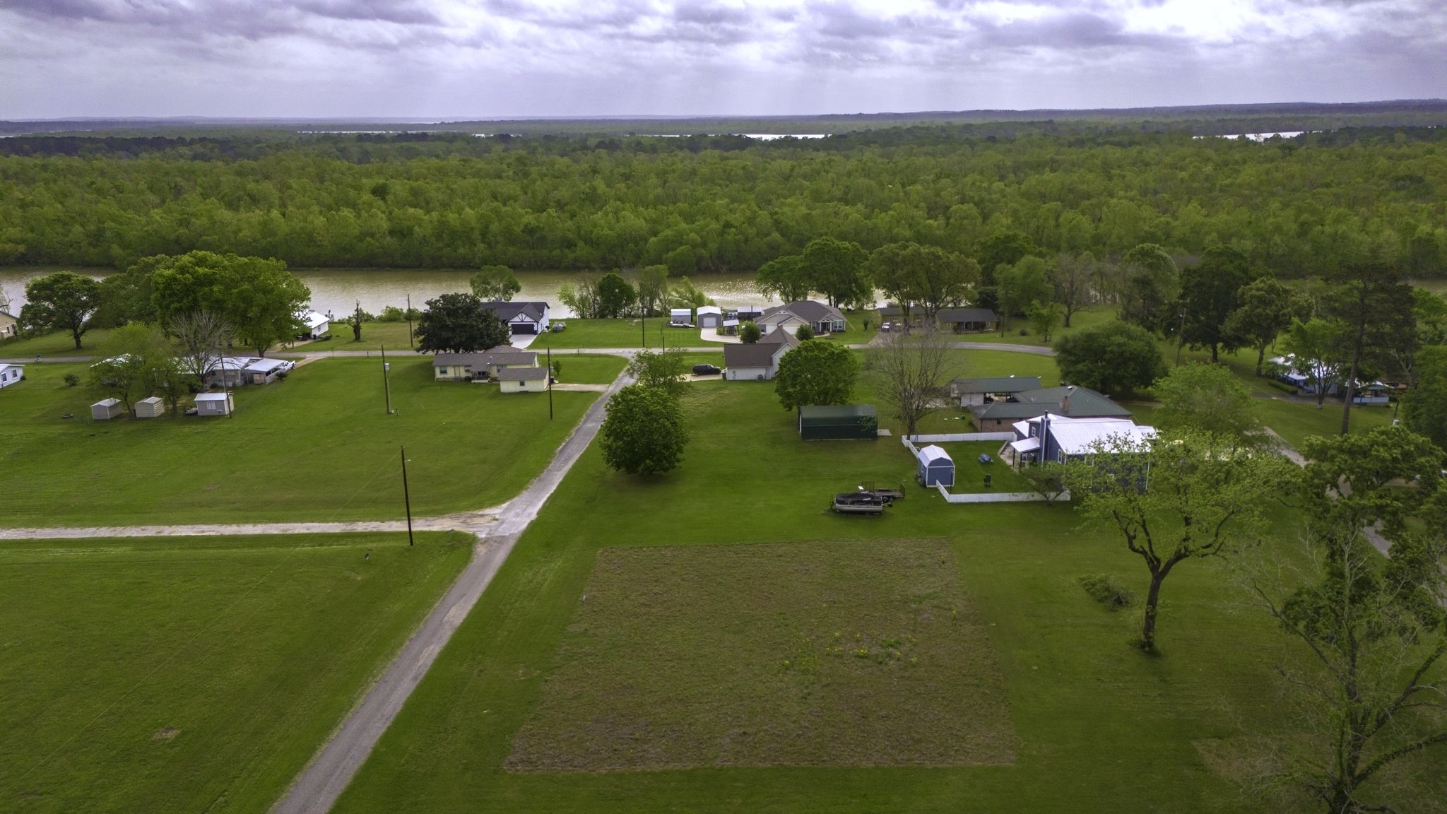 Tbd Liendo Drive Trinity, TX 75862 - Photo 8 of 13 a view of a lake with houses