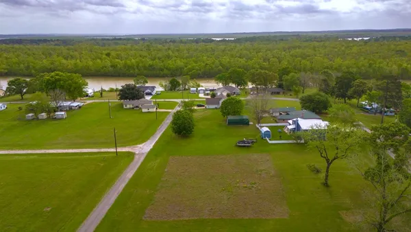 a view of a golf course with a lake