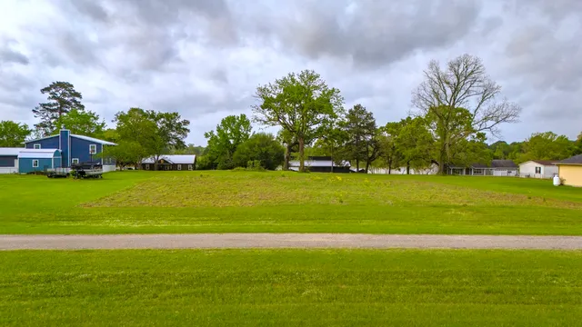 a view of a golf course with a lake
