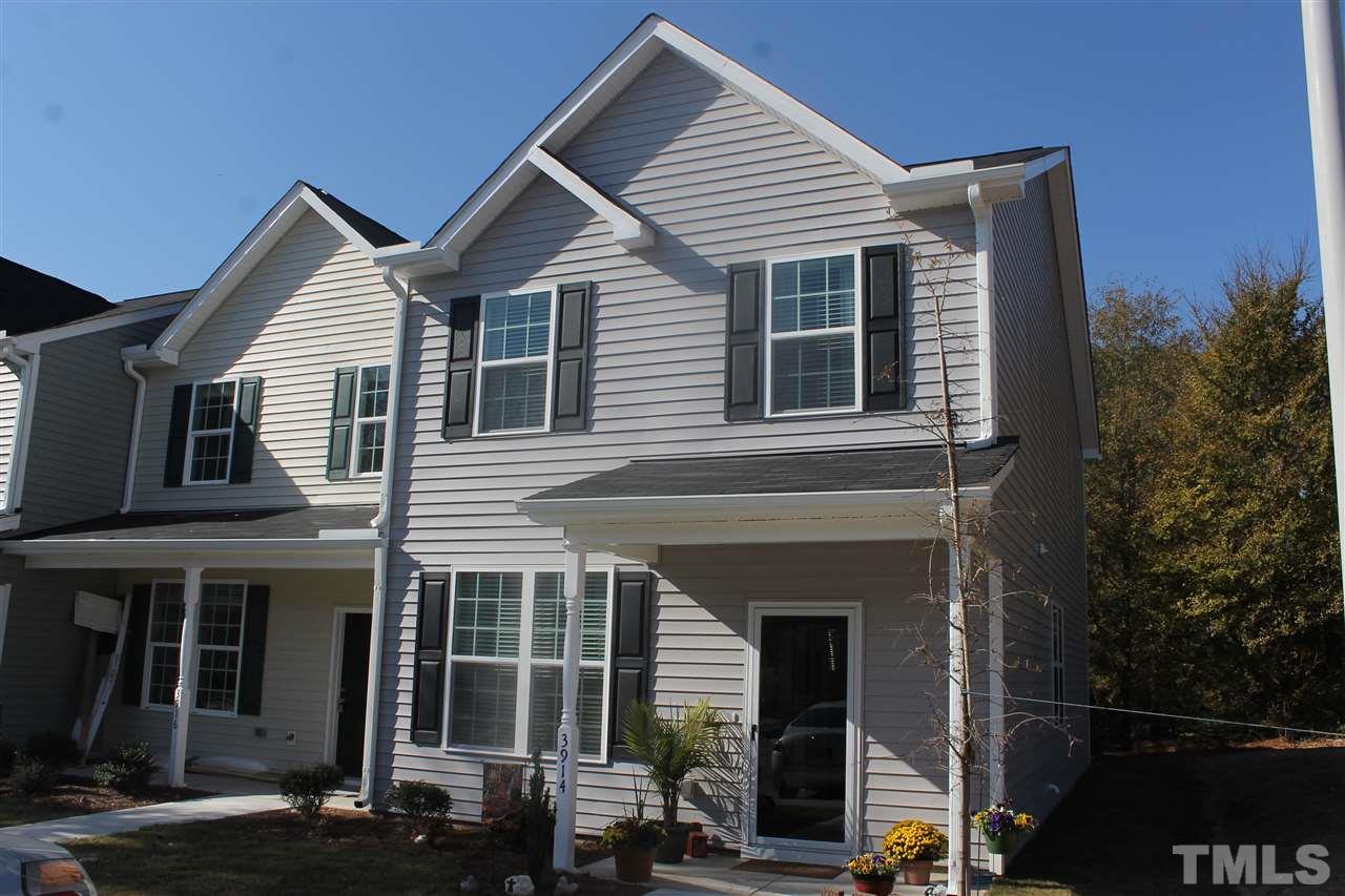 3908 Volkswalk Place Raleigh, NC 27610 - Photo 3 of 20 a view of a house with a yard