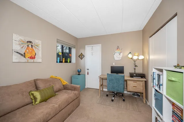 a workspace with furniture and a couch