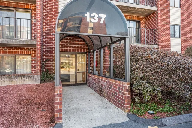 a view of a balcony with door