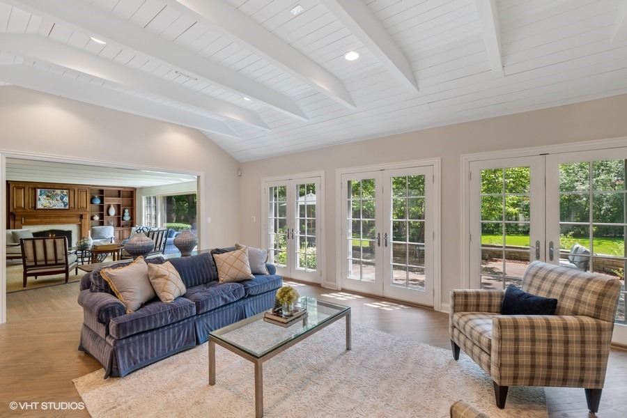 340 Old Farm Road Northfield, IL 60093 - Photo 12 of 50 a living room with furniture and floor to ceiling windows