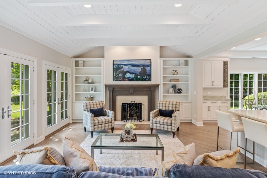 340 Old Farm Road Northfield, IL 60093 - Photo 14 of 50 a living room with furniture a fireplace and a large window