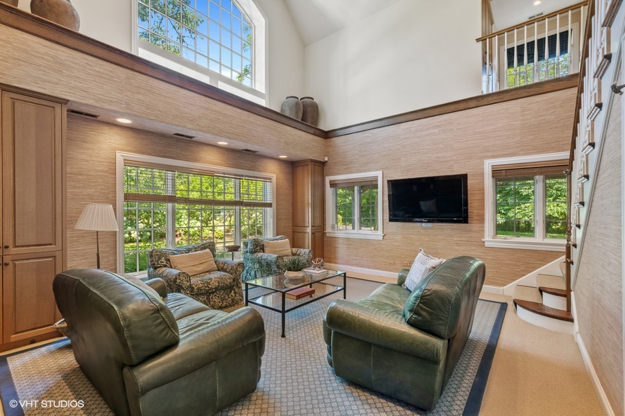 340 Old Farm Road Northfield, IL 60093 - Photo 20 of 50 a living room with furniture and a large window