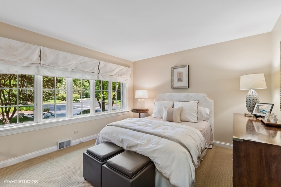 340 Old Farm Road Northfield, IL 60093 - Photo 29 of 50 a bed room with a bed and a chair