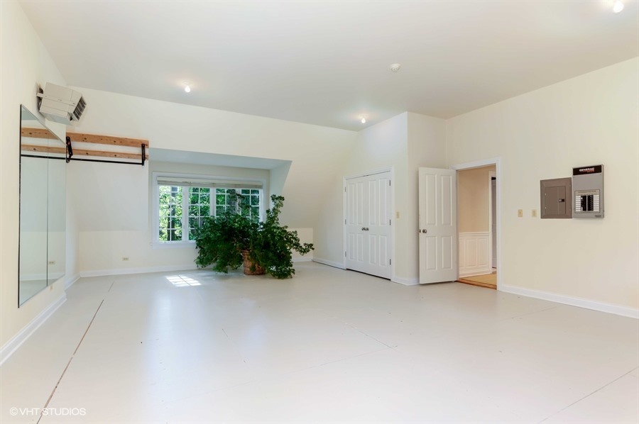 340 Old Farm Road Northfield, IL 60093 - Photo 34 of 50 a view of an empty room with a window