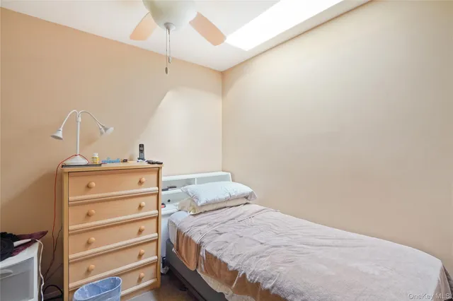 a white toilet sitting next to a shower curtain
