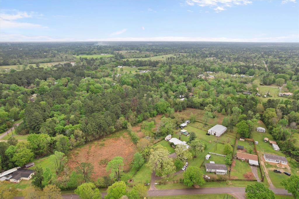 14036 Old Texaco Road Conroe, TX 77302 - Photo 40 of 40 Aerial view with a wooded view
