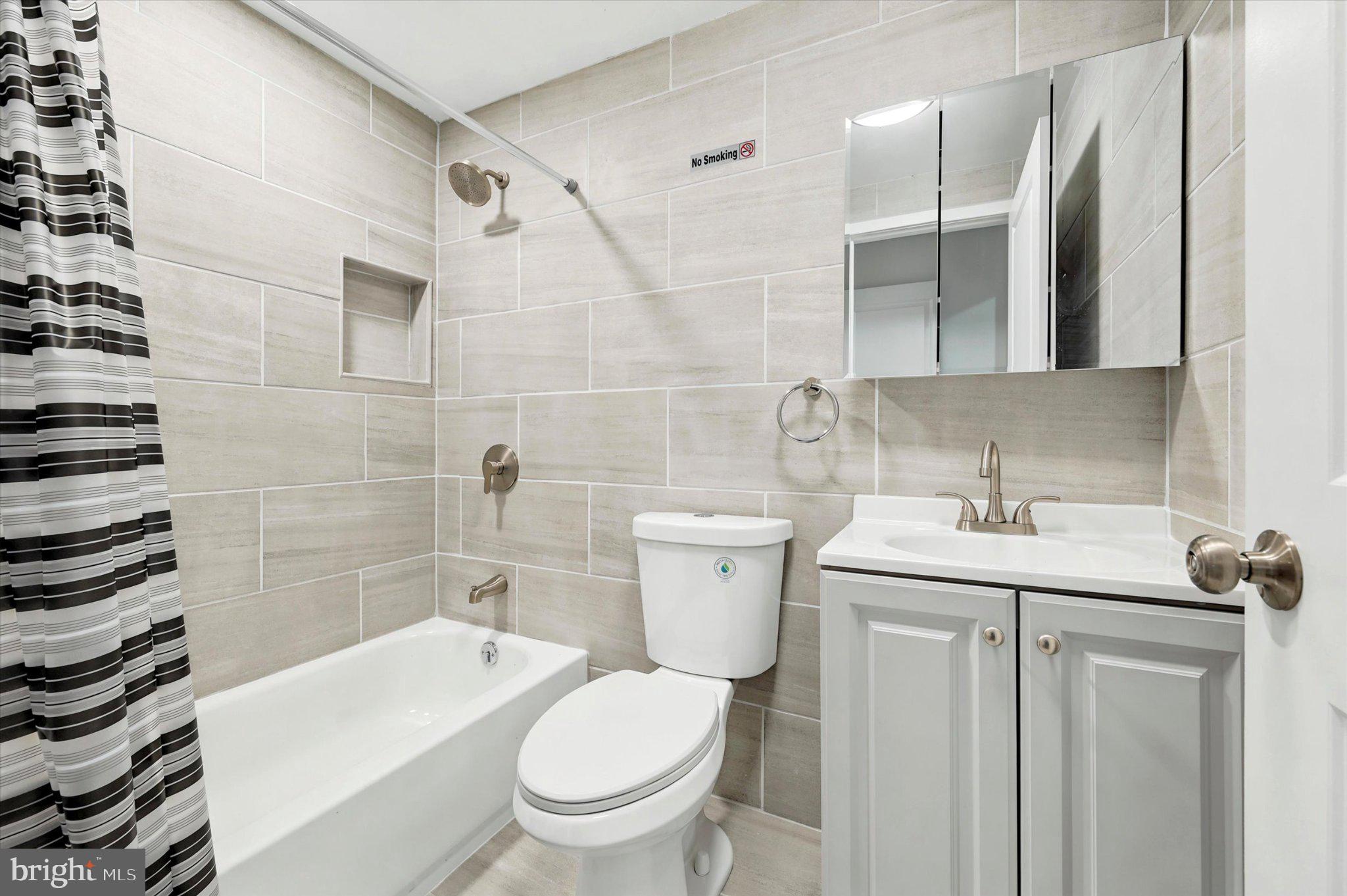 514 Ryers Avenue, Unit A Cheltenham, PA 19012 - Photo 18 of 18 Modern bathroom with sleek finishes.