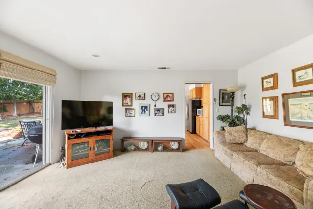 a bathroom with a sink toilet and window