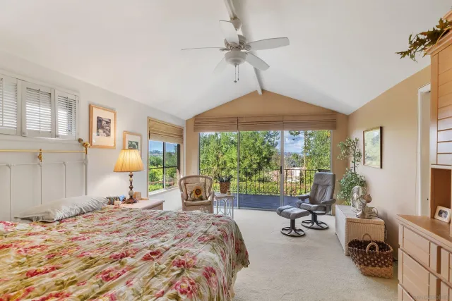a bedroom with a bed and a cabinets