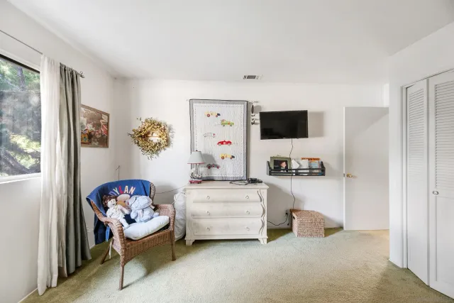 a backyard of a house with seating space