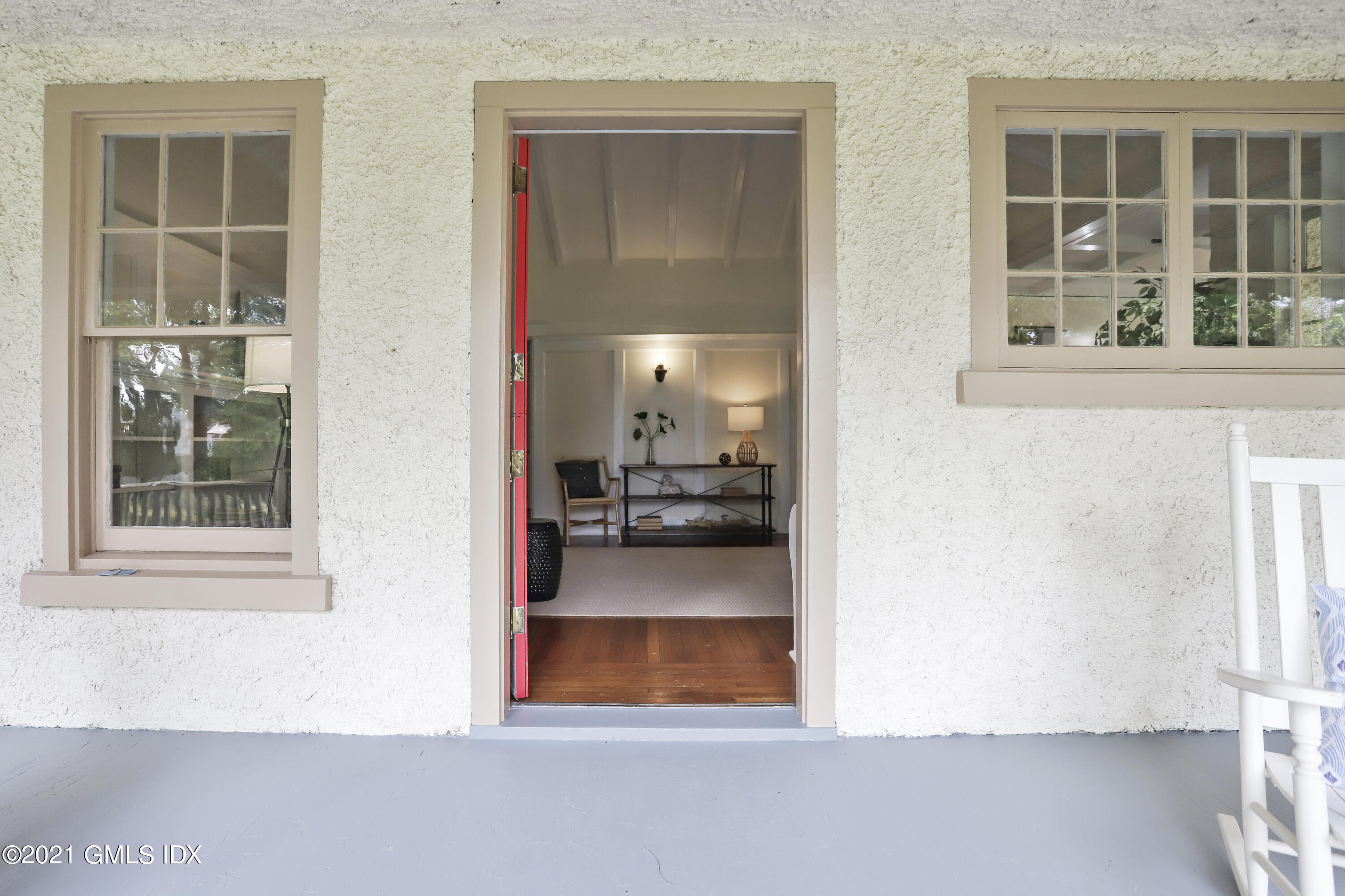 35 Strickland Road Cos Cob, CT 06807 - Photo 4 of 25 a view of front door of house